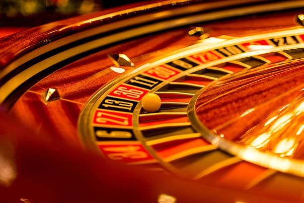 Slot game spinning on mobile phone screen Slot game spinning on mobile phone screen